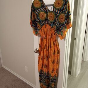 2 dresses from Somya collection. Size. Would fit Small or Medium. Tag says Talla